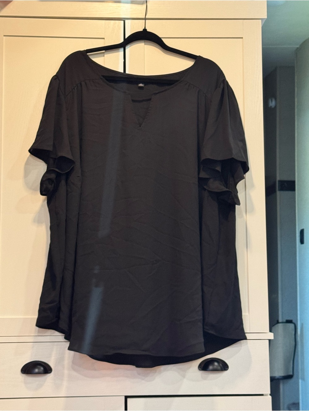 Torrid Black Blouse with fluttered sleeves.